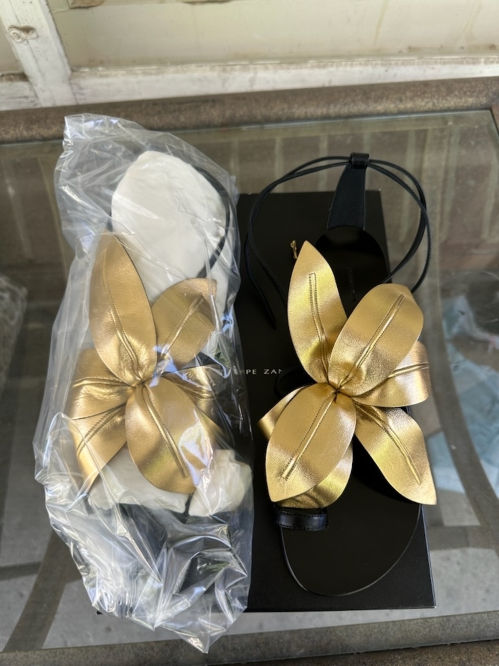 Giuseppe Zanotti Black Sandals with Gold Floral Bow - Picture 2 of 4